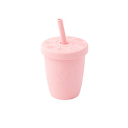Pink silicone straw cup with a straw on a white background