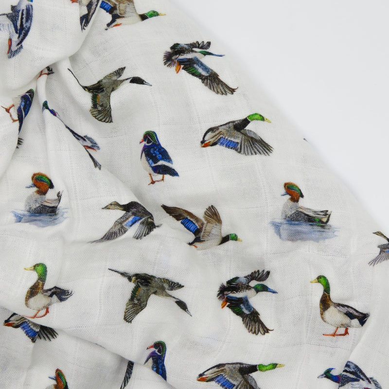 Close-up of Saltwater Swaddles Lucky Ducks fabric with detailed hand-painted ducks, including Mallards, Teals, and Pintails