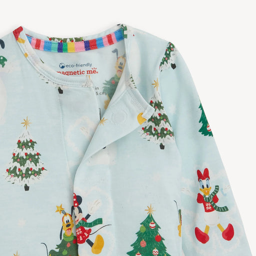 Close-up of neckline and chest showing magnetic placket and Mickey and Friends holiday print