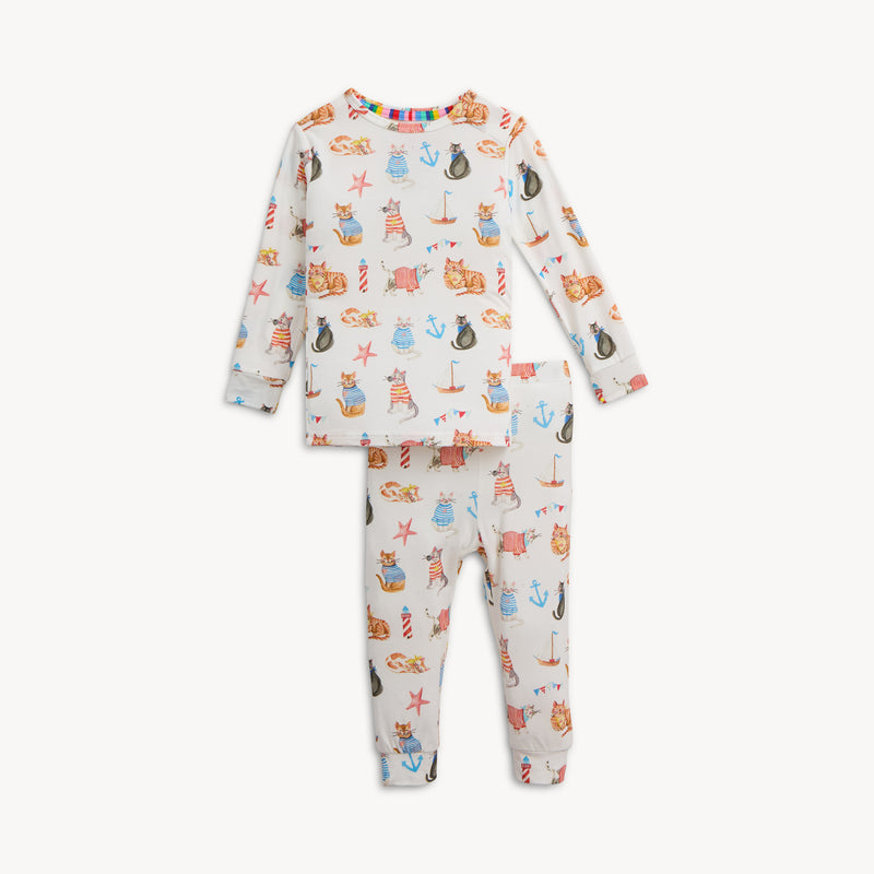 Children's pajama set with animal pattern on a white background