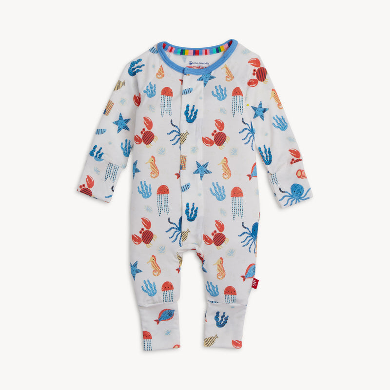 Baby onesie with colorful sea creature pattern on a white background