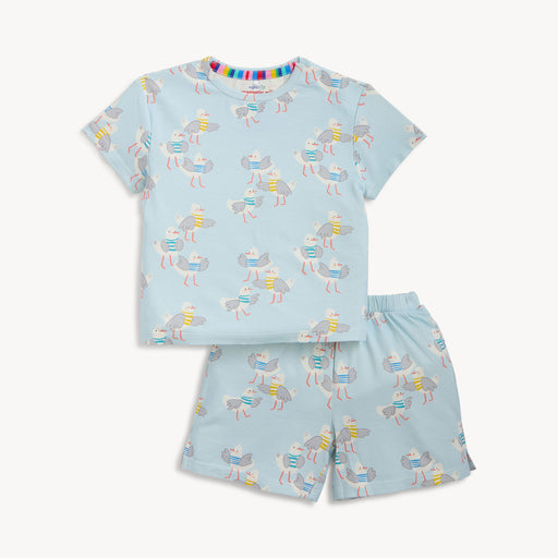 Children's pajama set with seagull pattern on a light blue background