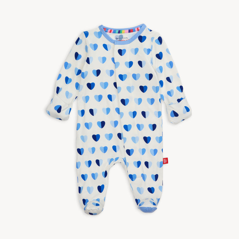 Full view of Magnetic Me Footie in Blue XOXO print with blue cuffs and allover heart design