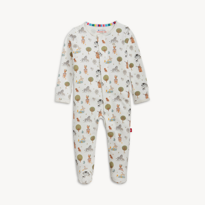 Baby onesie with farm animal pattern on a white background