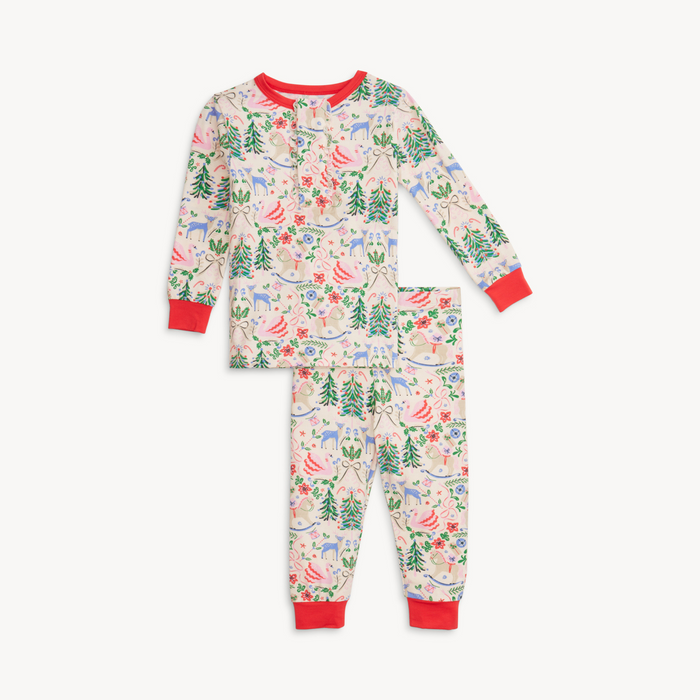 Children's pajama set with a festive pattern on a white background