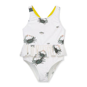 Children's swimsuit with crab pattern on a white background