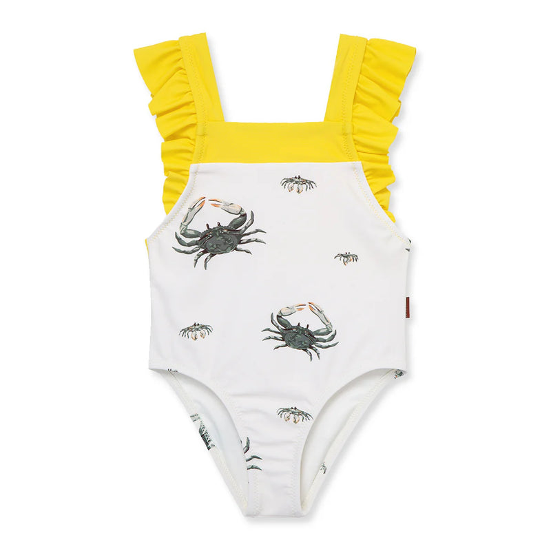 One-piece baby toddler girl swimsuit with yellow straps and crab pattern on a white background