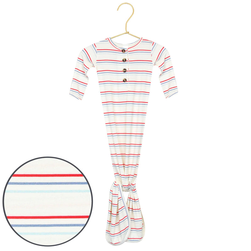 Striped baby onesie on a hanger with close-up inset showing pattern details.