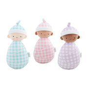 Three baby dolls wrapped in gingham blankets with hats on a white background