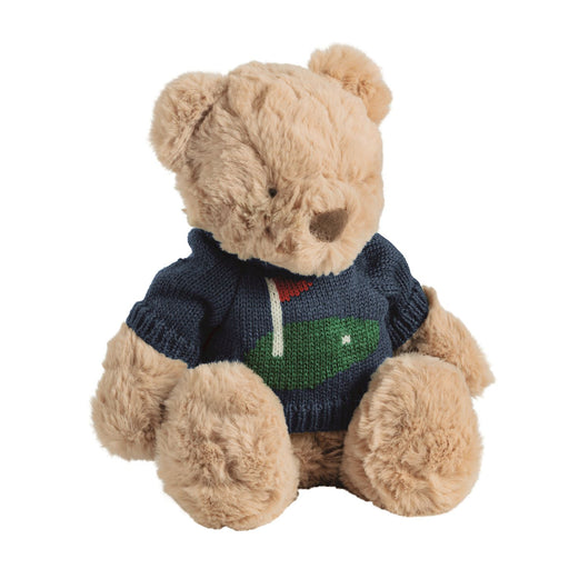 Teddy bear wearing a blue sweater with a logo on a white background