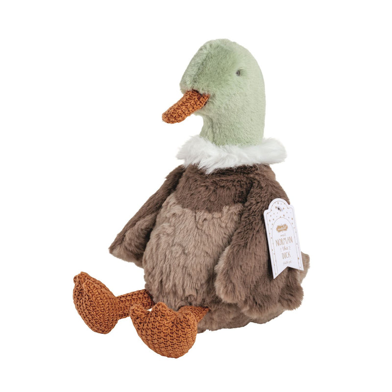 Plush duck toy with a tag on a white background