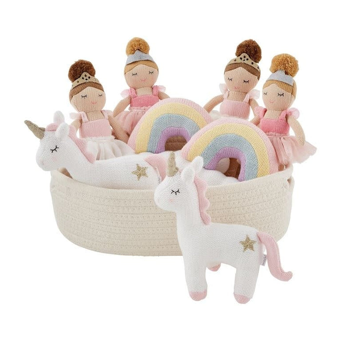 Group image featuring all four Mud Pie knit rattles—Princesses, Unicorn, and Rainbow—displayed in a soft neutral basket.