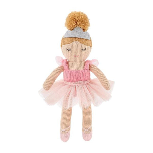 Knitted doll in a ballerina outfit with a pink dress and beige skirt on a white background