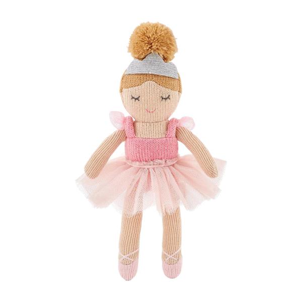 Knitted doll in a ballerina outfit with a pink dress and beige skirt on a white background