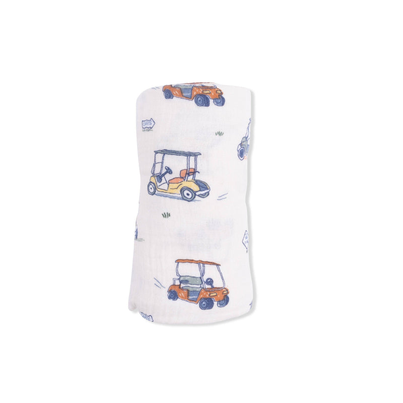 White swaddle blanket with colorful golf cart pattern on a white background