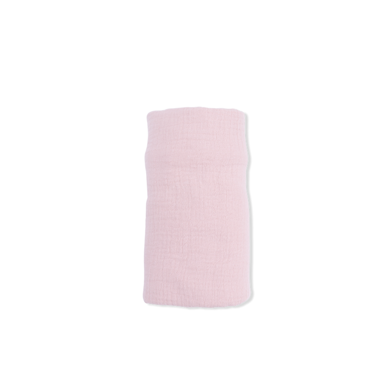 Pink textured blanket on a white background