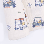 fabric with golf cart designs on a white background
