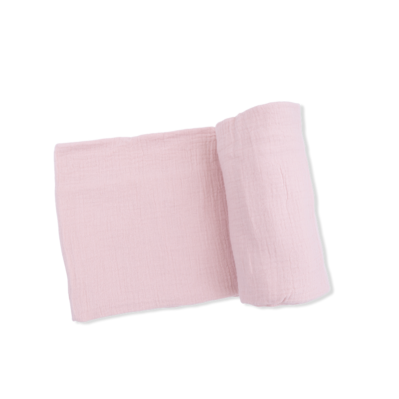 Pink fabric swaddle on a white background