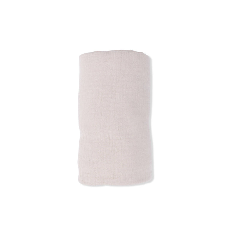 tan swaddle balnket on a white background