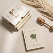 Wooden toy, book, and decorative elements on a light surface