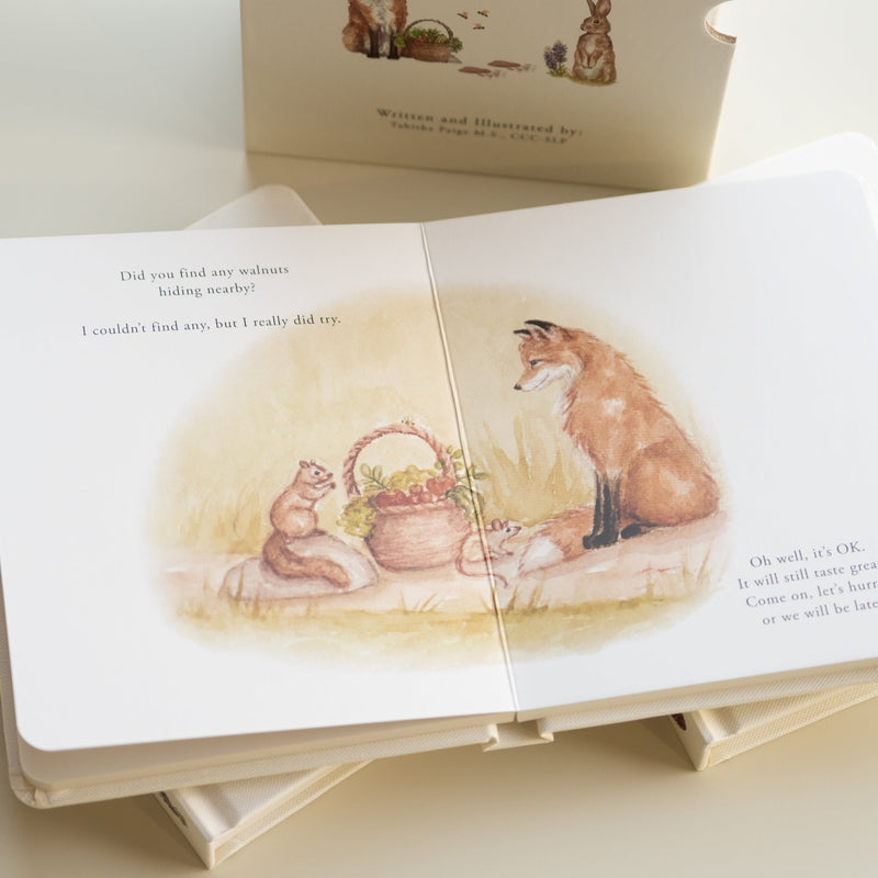 Children's book with fox illustration on a light surface