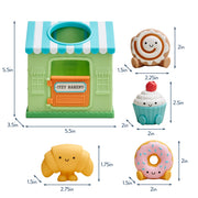 Diagram showing dimensions and individual bakery toy pieces included in the set