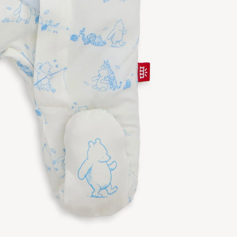 Close-up of Pooh in the Woods footie with non-slip baby foot grips