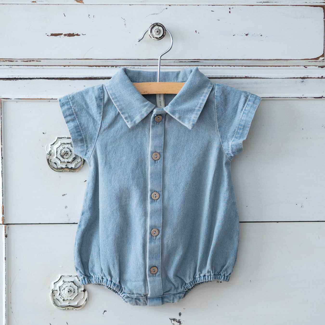 white baby sleeveless bubble outfit by heyward house with blue safari animals