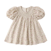 Floral dress with puff sleeves on a white background