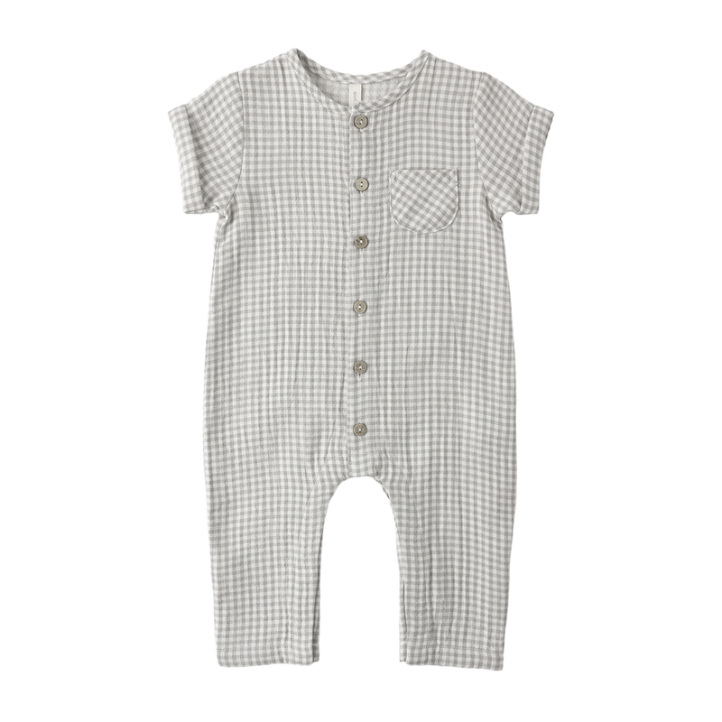Checkered baby romper with buttons on a white background