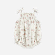 Floral baby romper on a white background