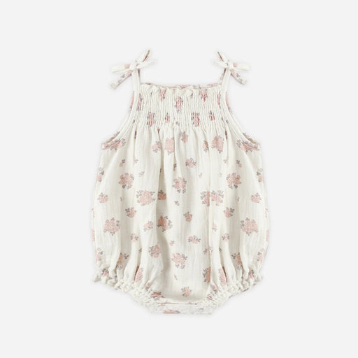Floral baby romper on a white background
