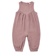Pink baby romper on a white background