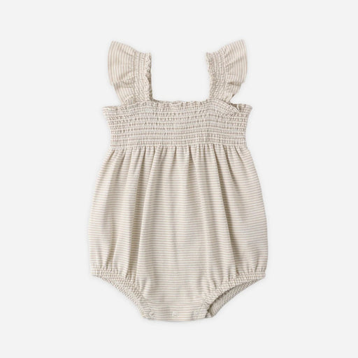 Baby romper with ruffled straps on a white background