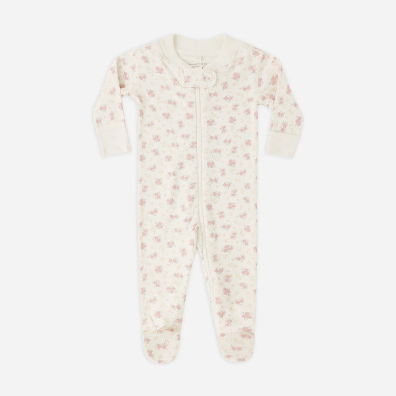 Baby onesie with floral pattern on a white background