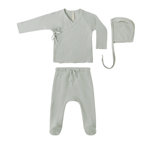 Baby outfit set with long-sleeve top, pants, and hat on a white background