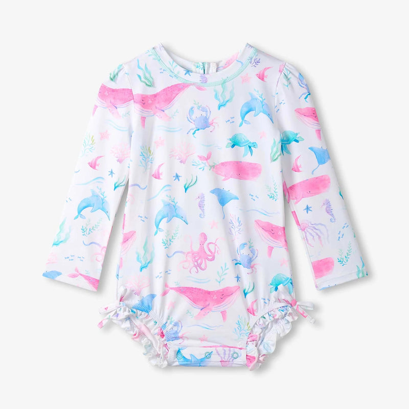 Children's swimsuit with colorful sea life pattern on a white background