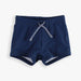 Navy blue swim shorts with a striped drawstring on a white background