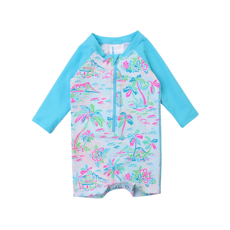 A long sleeve boys rash guard with a tropical resort print in blue, white, and multicolor, featuring a full zipper and snaps at the bottom.