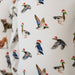 White shirt with colorful duck pattern on a white background