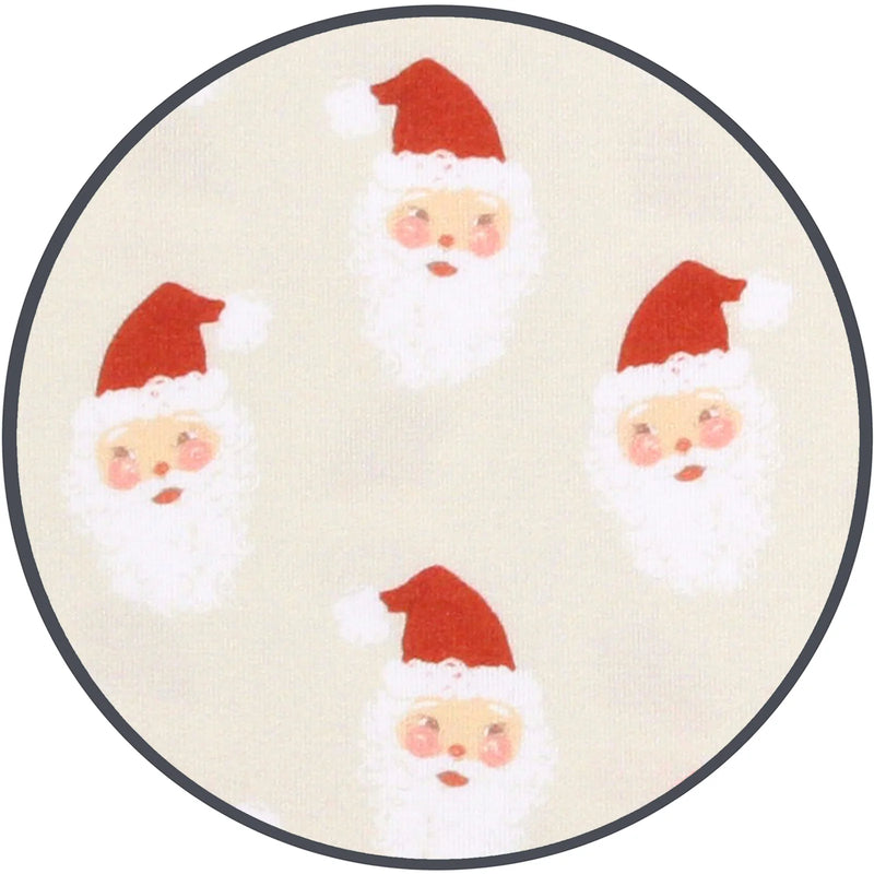 Closeup of details - Santa Claus faces on a beige background