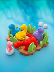 SmartGames Tiptoe Dino game set with dinosaurs and eggs