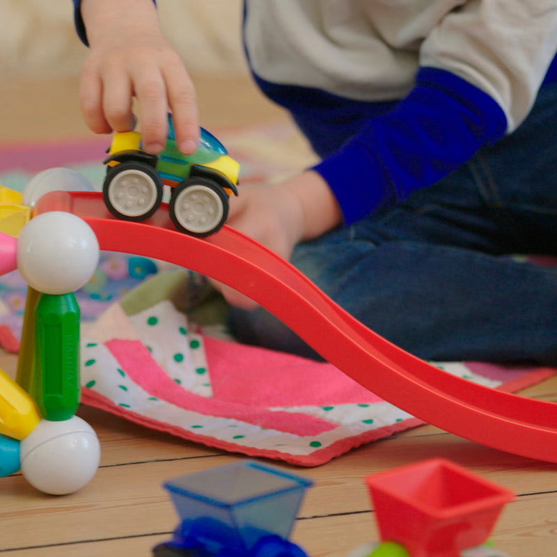 SmartMax magnetic car racing down a red ramp