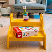 SmartMax My First Stacking Rings built on a toddler table with the box