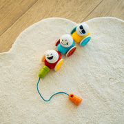 SmartMax My First Wobbly Cars with pull string on a fluffy rug