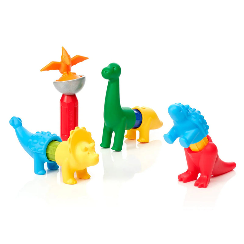 Set of colorful dinosaur-shaped sand toys on a white background