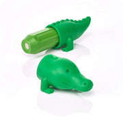 Two green alligator-shaped objects on a white background