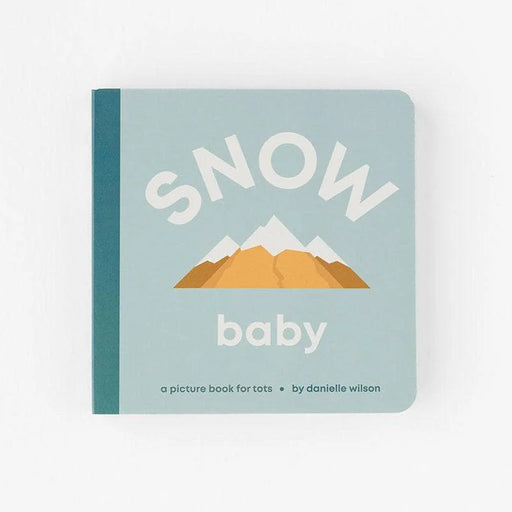 Children's book titled 'Snow Baby' with mountain illustration on a light gray background