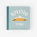 Children's book titled 'Snow Baby' with mountain illustration on a light gray background