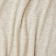 Close-up of beige fabric with folds